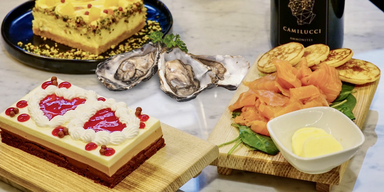 box di san valentino con ostriche, salmone, champagne, torta a cuore